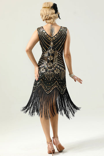 Vestido de lentejuelas negras y doradas de la década de 1920